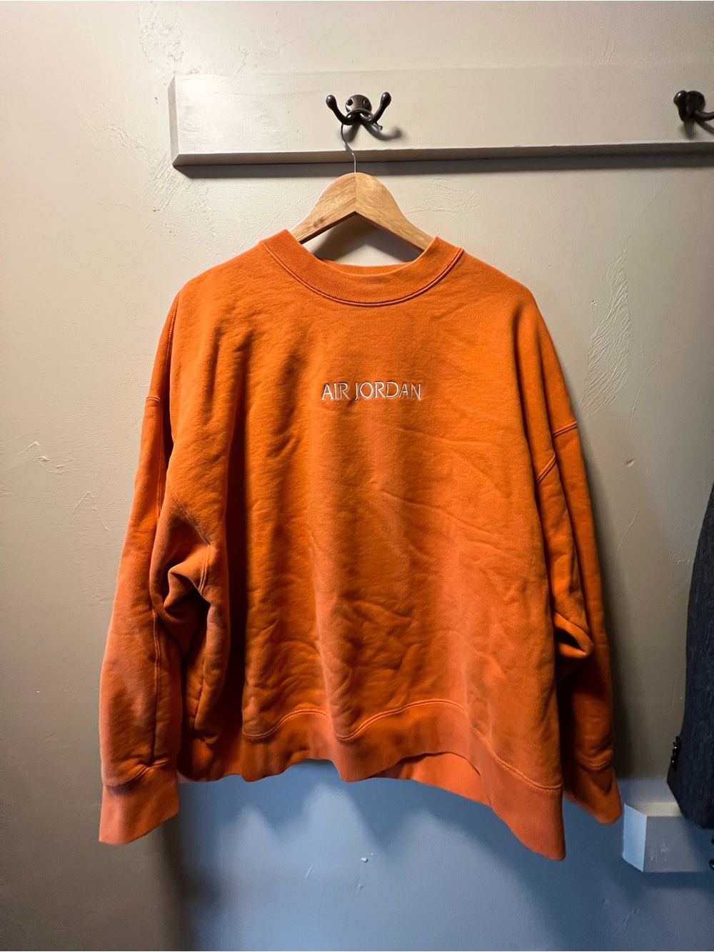 Jordan Orange Crewneck Sweatshirt with White Embroidered Logo